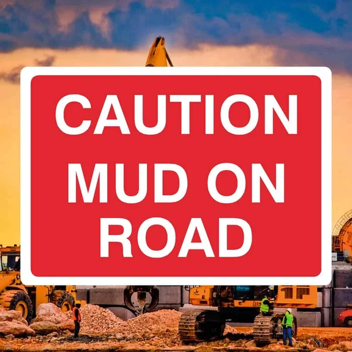 Mud-On-Road Caution Sign